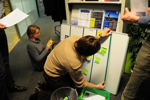Green team building their board Green team building their board